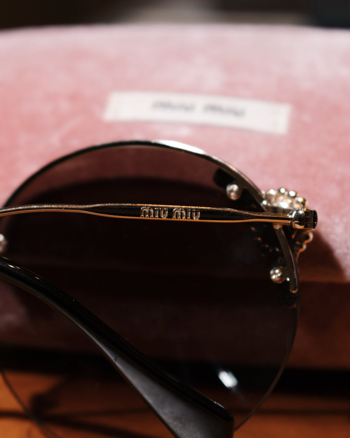 Óculos Miu Miu Manière